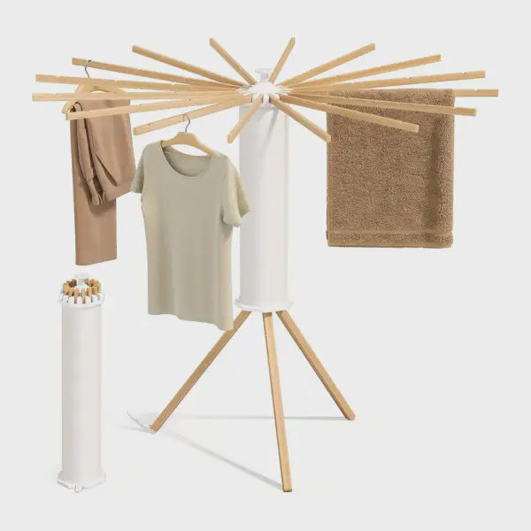 A rotating clothes rack with 16 beech wood arms that locks onto a pole