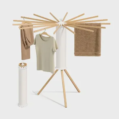 A rotating clothes rack with 16 beech wood arms that locks onto a pole